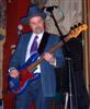 George Bradfute (on bass!) onstage at Webb Fan Fest, Nov.2006 (pic 8).